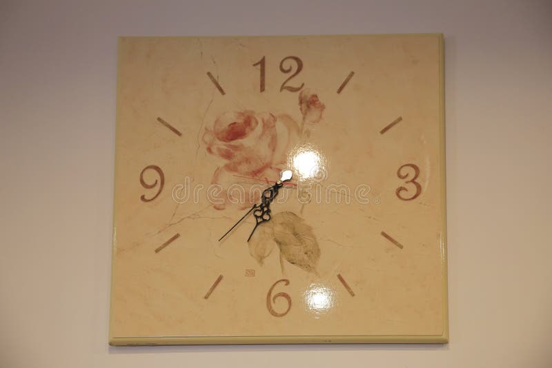 A Square Clock , Wall Clock Isolated on White Editorial Stock Photo