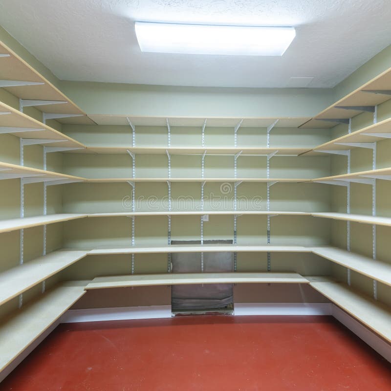 Square Frame Interior of a Food Storage Room with Empty Shelves at the