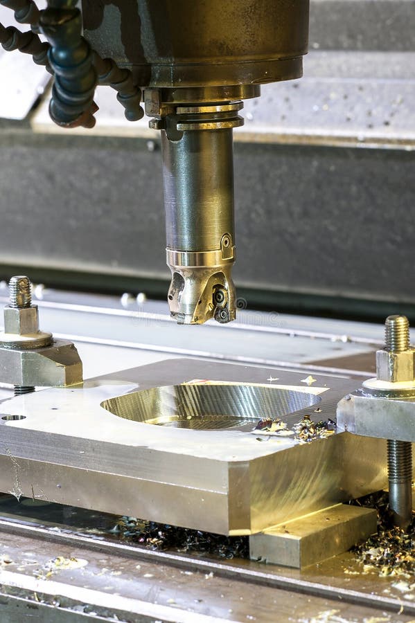 Square industrial metal mold/blank milling. Metal engineering. stock photography Square industrial metal mold/blank milling. Metal engineering. stock photography