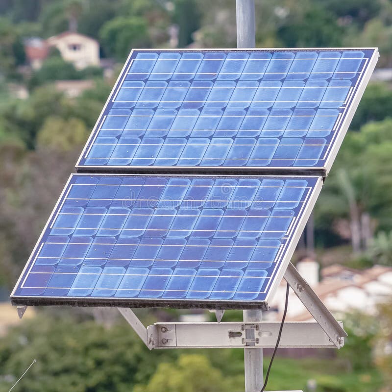 Square Photovoltaic Solar Panel For Renewable Energy On A Cloudy Day Stock Photo Image of