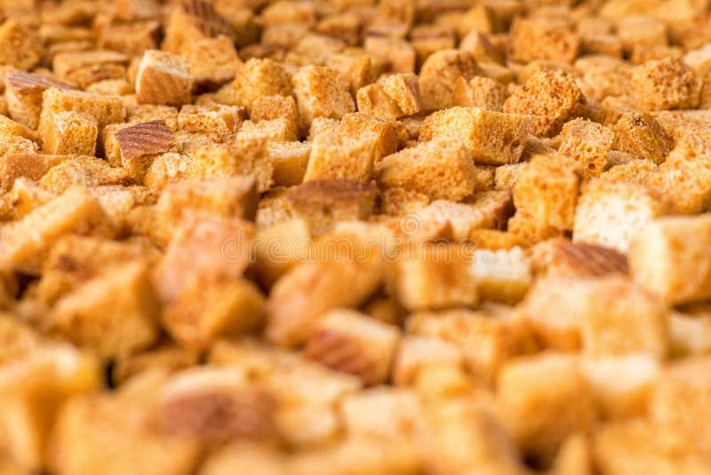 Squareshaped Bread Crumbs in a Blue Pot on a White Background. Oven