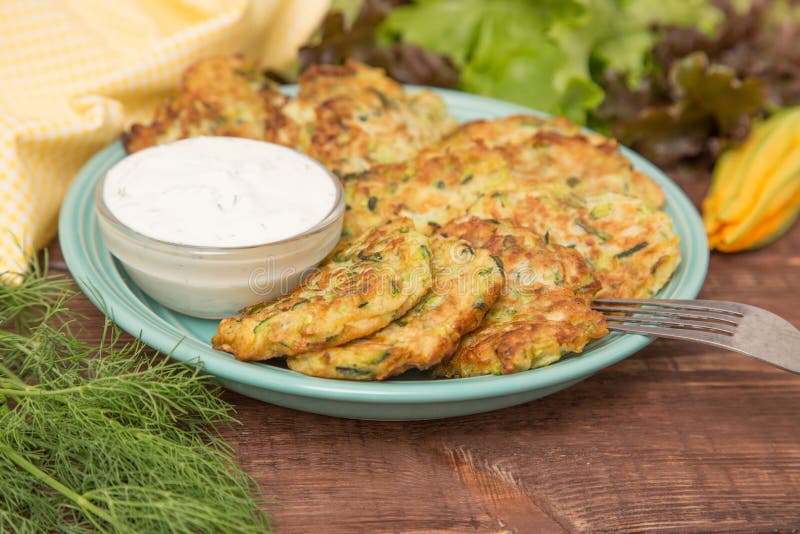 Squash and Zucchini Fritters with Flowers Zucchini and Herbs Stock