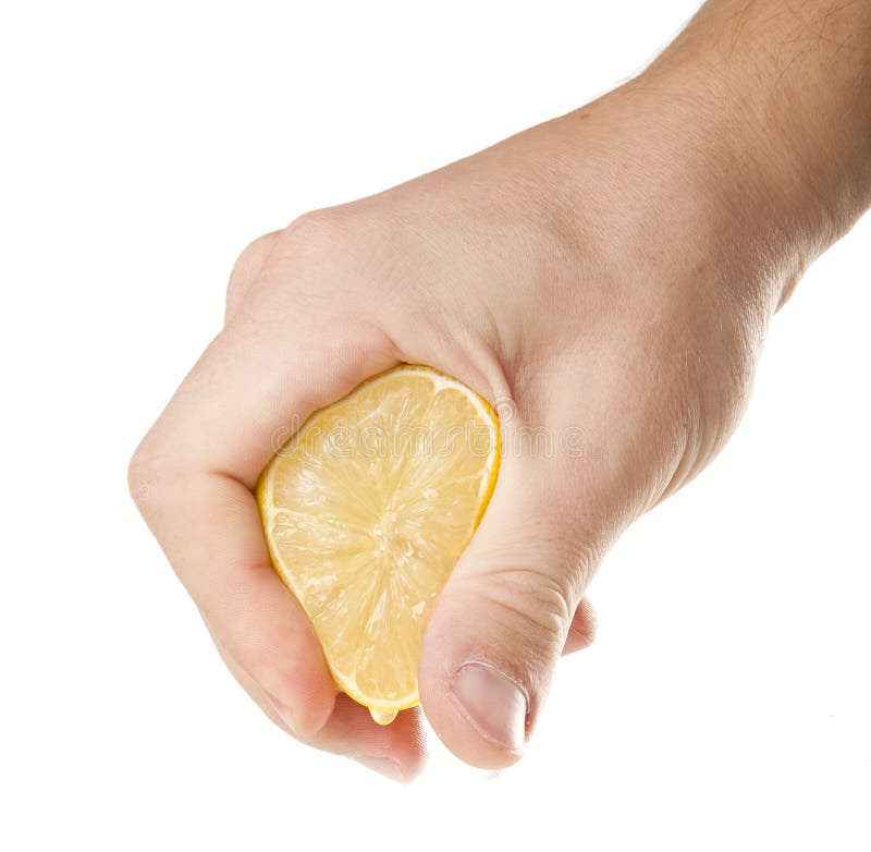 Squeezing lemon in hand and drop