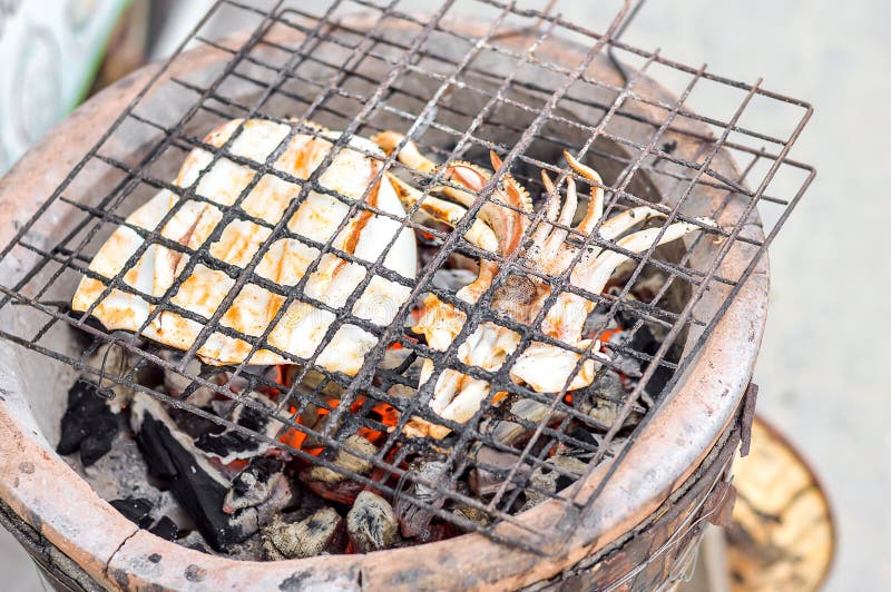 Squid grill on stove stock image. Image of fire, kitchen 136411315