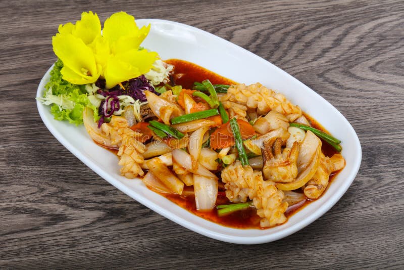 Squid in sauce stock image. Image of fresh, restaurant - 111771331