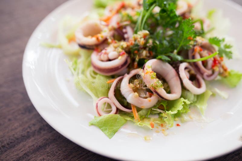 Steamed squid with lime stock image. Image of eyes, food 27212653