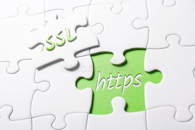 SSL 和 HTTPS 这两个词在一个未完成的拼图中 免版税库存照片