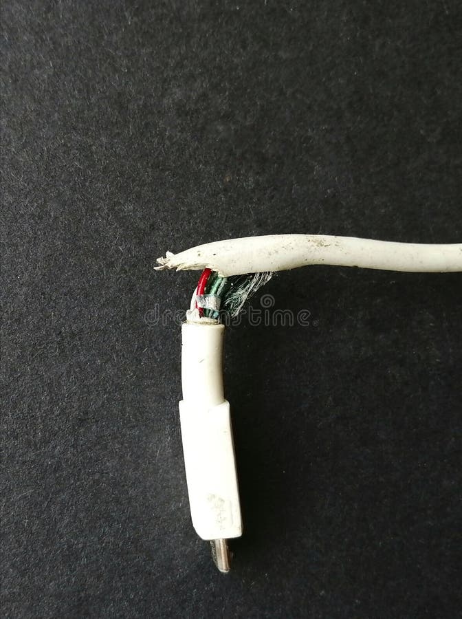 St Annes. UK. 09.12.2020. Broken USB Cable a Fire Hazard. Stock Image