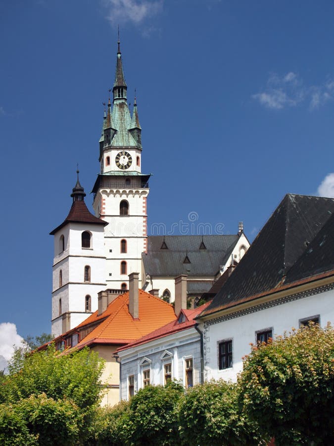 St. Catherine church and Kremnica Castle. Summer view of Kremnica Castle and tower of Gothic church of St. Catherine (kostol sv. KatarÃny). This castle build royalty free stock photography St. Catherine church and Kremnica Castle. Summer view of Kremnica Castle and tower of Gothic church of St. Catherine (kostol sv. KatarÃny). This castle build royalty free stock photography