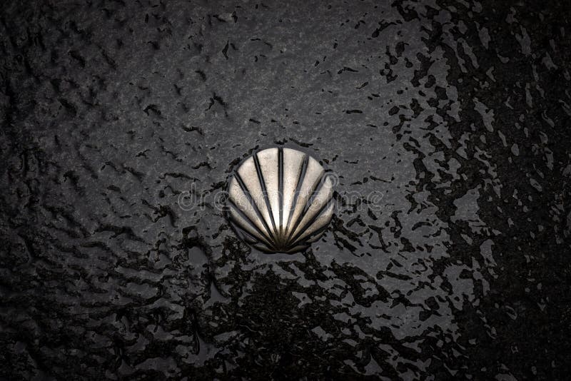 St James Way Shell Symbol. Camino de Santiago bronze sign. Pilgrimage to Santiago de Compostela, Galicia, Spain royalty free stock images