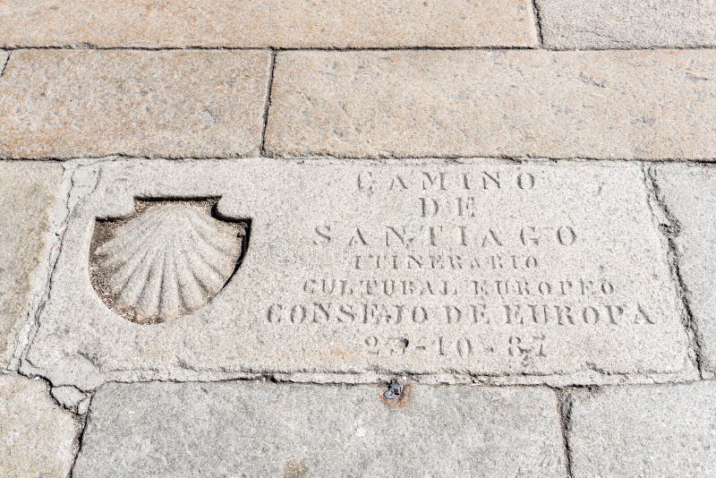 St James Way Shell Symbol and text engraved in a paving stone royalty free stock image