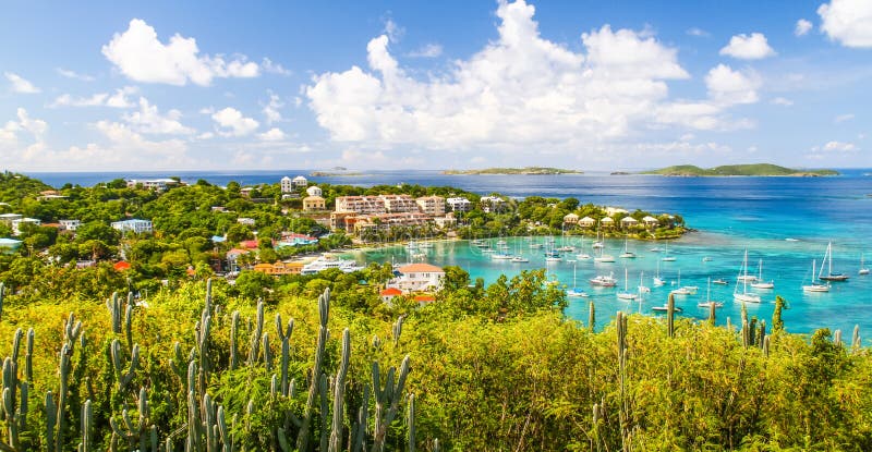 A wonderfully colorful view from above the fleet of sailboats and yachts anchored the harbor in Cruz Bay on the island of St. John, in the US Virgin Islands. St. John is a fantastic place to persue outdoor recreation activities such as sailing, hiking, swimming, snorkeling, scuba diving, kayaking and fishing. St. John is a popular day trip destination for cruise ship passengers visiting nearby St. Thomas. A wonderfully colorful view from above the fleet of sailboats and yachts anchored the harbor in Cruz Bay on the island of St. John, in the US Virgin Islands. St. John is a fantastic place to persue outdoor recreation activities such as sailing, hiking, swimming, snorkeling, scuba diving, kayaking and fishing. St. John is a popular day trip destination for cruise ship passengers visiting nearby St. Thomas.