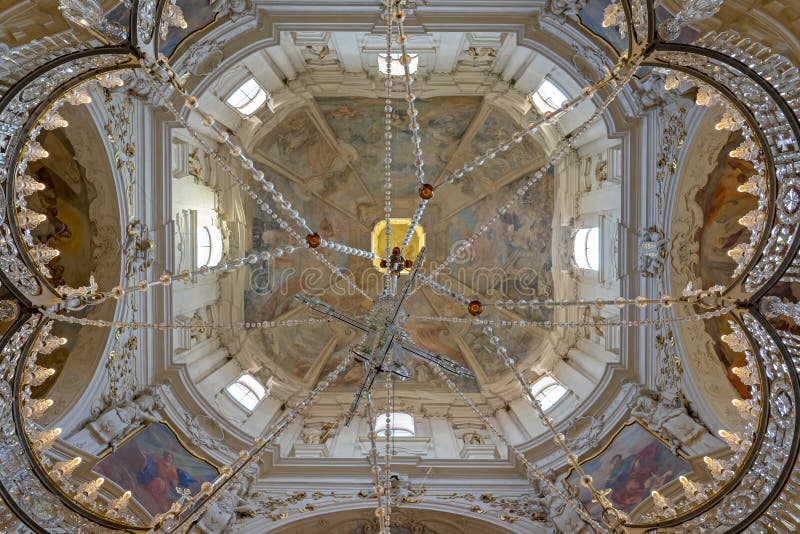 PRAGUE, CZECH REPUBLIC - 28th of July 2016 - Stunning interior and crystal crown chandelier in the Baroque St Nicholas Cathedral Old Town Prague, a popular tourist destination.