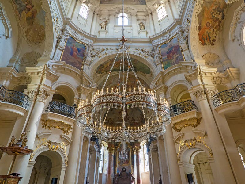 PRAGUE, CZECH REPUBLIC - 28th of July 2016 - Stunning interior and crystal crown chandelier in the Baroque St Nicholas Cathedral Old Town Prague, a popular tourist destination.