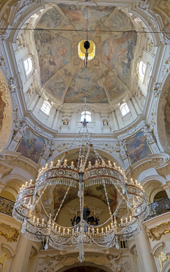 PRAGUE, CZECH REPUBLIC - 28th of July 2016 - Stunning interior and crystal crown chandelier in the Baroque St Nicholas Cathedral Old Town Prague, a popular tourist destination.