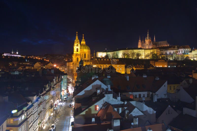 Nightview of St.Nicholas cathedral and prague hradcany castle in mala strana, Prague