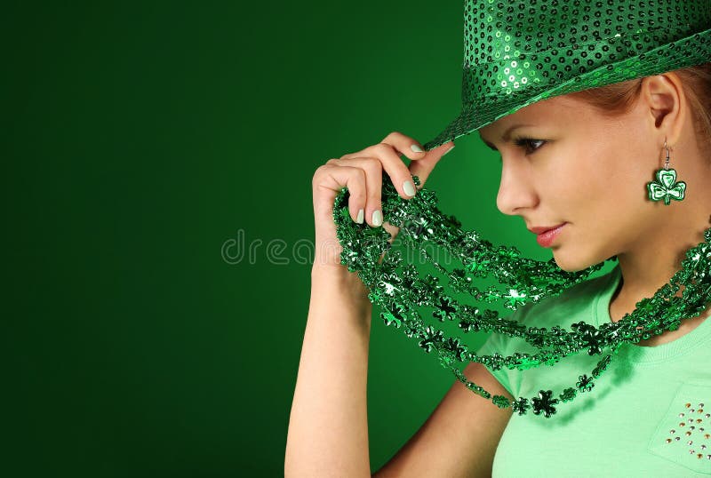 St Patrick s day Girl. Young woman wearing hat over green