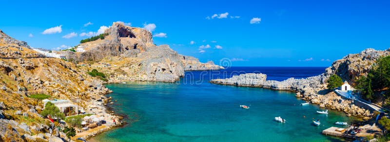 Panoramic shot overlooking St Pauls Bay at Lindos on the Island of Rhodes Greece Europe. Panoramic shot overlooking St Pauls Bay at Lindos on the Island of Rhodes Greece Europe