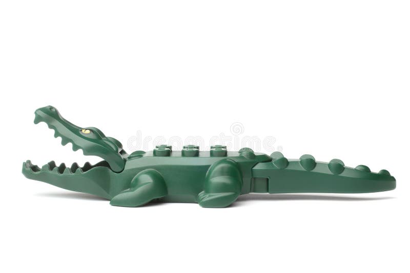 ST. PETERSBURG, RUSSIA - DECEMBER 13, 2015: A studio shot of a Crocodile Lego minifigure royalty free stock photography ST. PETERSBURG, RUSSIA - DECEMBER 13, 2015: A studio shot of a Crocodile Lego minifigure royalty free stock photography
