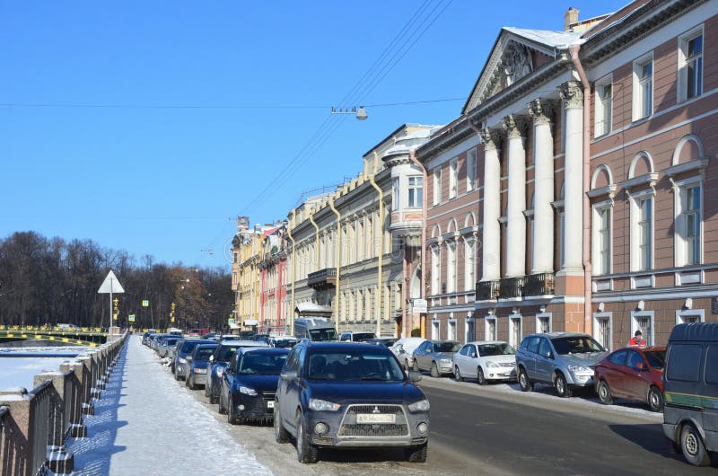 St. Petersburg, Russia, February, 27, 2018. Embankment of Fontanka river, Cars parked near house 18 - the house of Pashkov, mansio