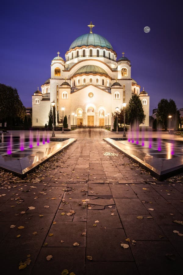 Night image of St. Sava Temple in Belgrade, Serbia, one of the largest orthodox temples in the world. Taken in autumn with fallen leaves on the ground due to long exposure. Night image of St. Sava Temple in Belgrade, Serbia, one of the largest orthodox temples in the world. Taken in autumn with fallen leaves on the ground due to long exposure.