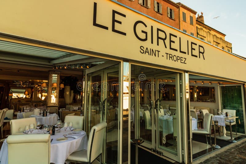 St. Tropez, France - 2019. Restaurant table setup. Empty restaurant in the harbor of St. Tropez