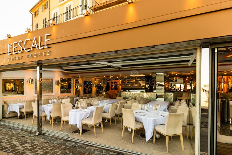 St. Tropez, France - 2019. Restaurant table setup. Empty restaurant in the harbor of St. Tropez