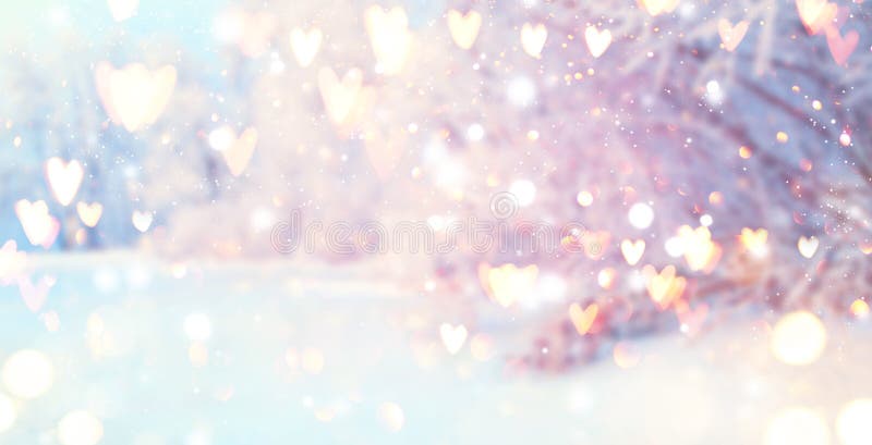 St. Valentine`s Day winter blurred background with glowing hearts. Xmas trees with snow, holiday festive background