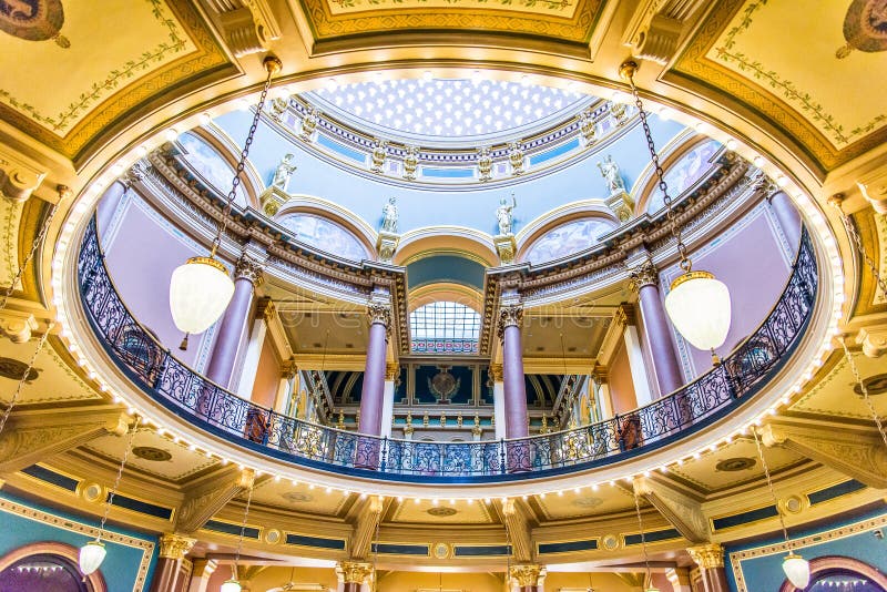 Inside the Des Moines Iowa State Capital building with ornate architecture and painted ceilings. Inside the Des Moines Iowa State Capital building with ornate architecture and painted ceilings