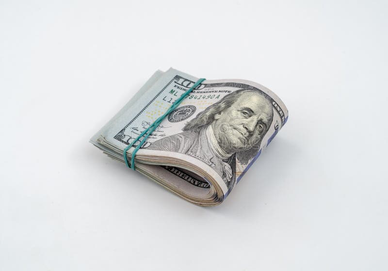Stack of American Dollars Tied with Rubber Band for Money Stock Photo