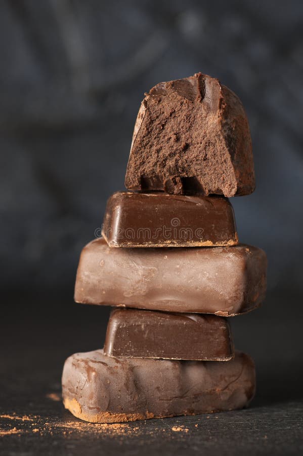 Stack of assorted chocolate candies stock photos Stack of assorted chocolate candies stock photos