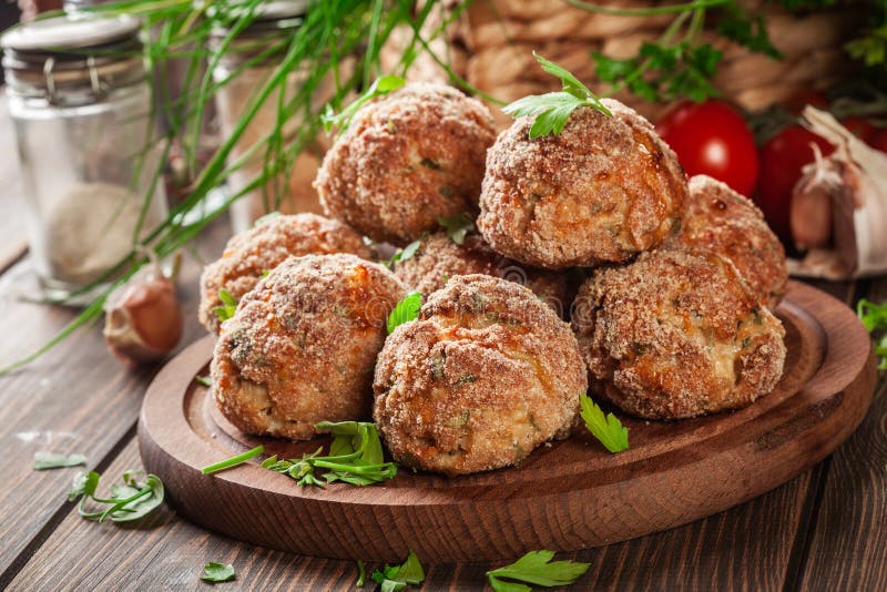 Stack of Baked Meatballs on a Chopping Board Stock Photo - Image of ...