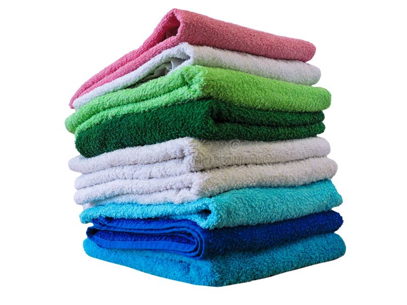Stack of Bath Towels on Light Wooden Background Closeup.Pile of Rainbow