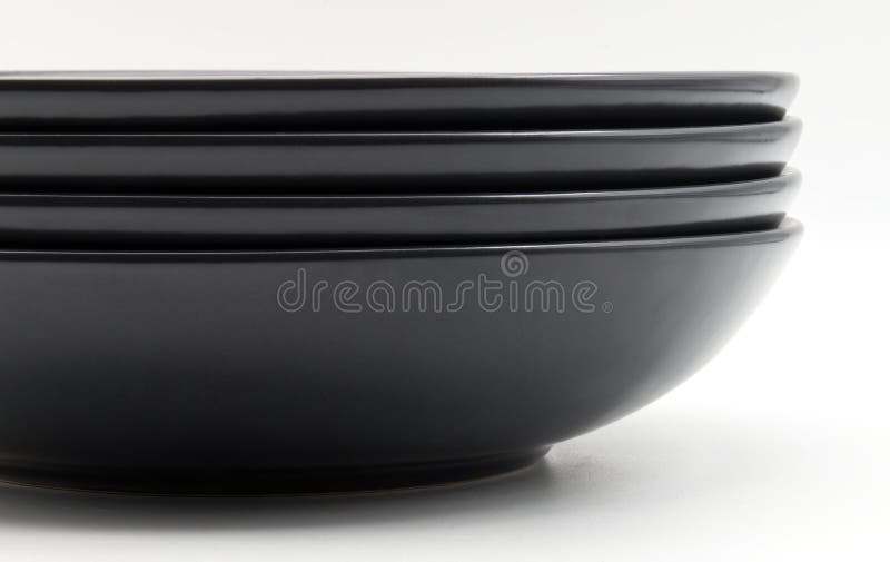 Stack of Black Dishes Isolated on White Background Stock Image Image