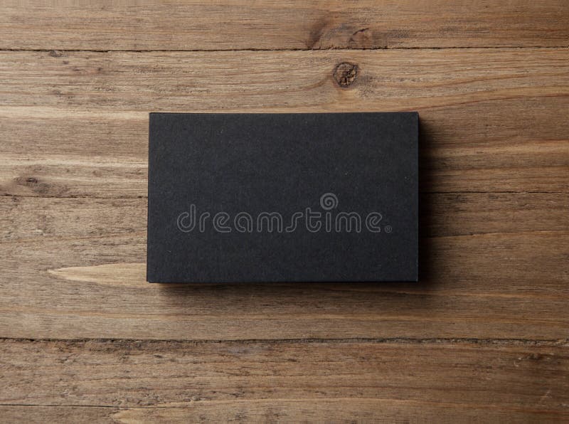 Stack of Blank Black Business Cards on Wooden Background Horizontal