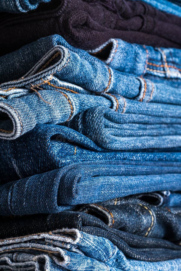 Heap of Modern Designer Blue Jeans Stock Photo - Image of showcase ...