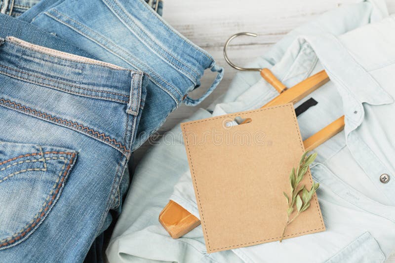 Stack of Blue Jeans and Denim Shirt on Hanger and Empty Craft Card ...