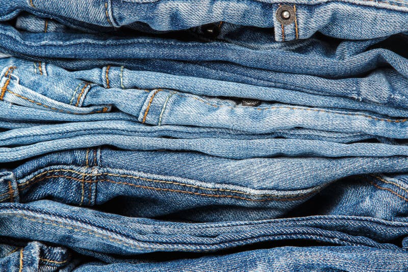 Stack of blue jeans stock photo. Image of casual, design - 57985386