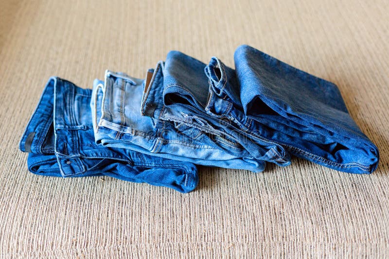 Stack of Blue Jeans.Shades of Denim Fabric. Stock Photo - Image of ...