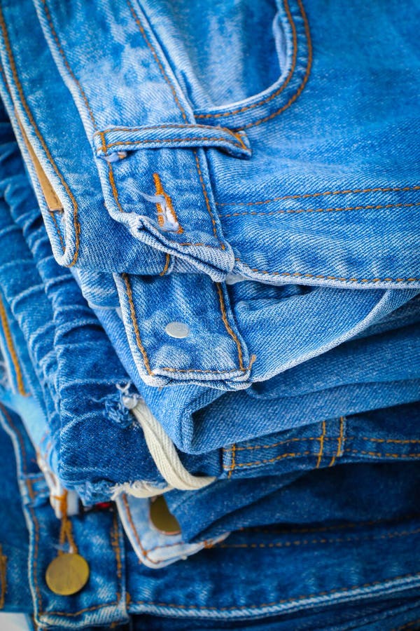 Stack of blue jeans stock image. Image of cotton, group - 107232969