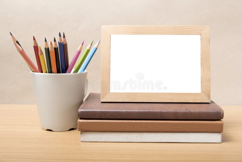 Stack of Book and Photo Frame with Color Pencil Stock Image Image of book, texture 57956561