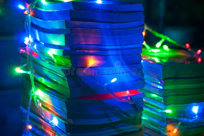 Stack of Books in Christmas Lights. Stock Image Image of colorful