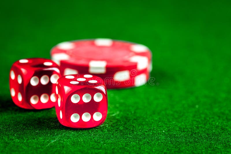 Stack of Chips Play Poker on Green Background Close Up Stock Photo