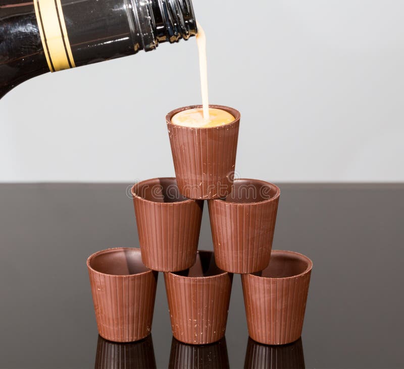 Miniature Liqueur Bottle by Chocolate Cup Stock Photo Image of