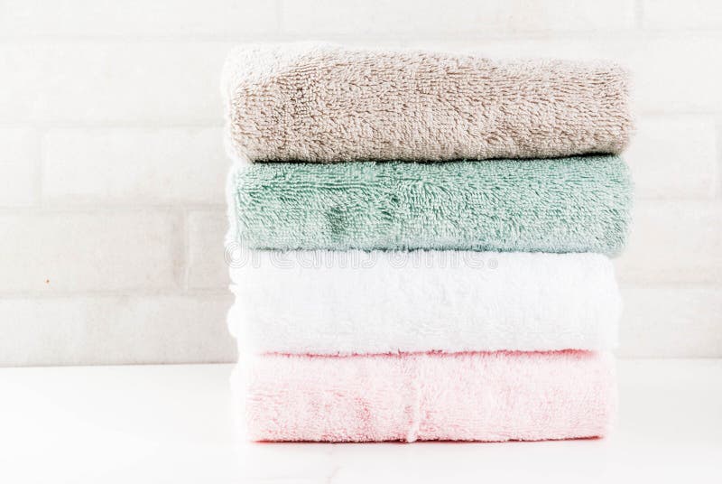 Stack clean bath towels stock image. Image of brown - 112068077