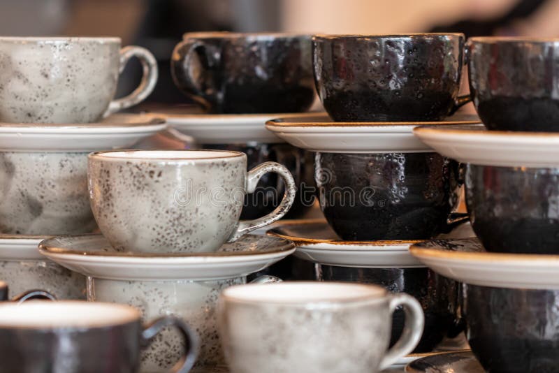 https://thumbs.dreamstime.com/b/stack-clean-ceramic-coffee-cups-saucers-background-empty-set-plates-stacked-banquet-drink-conferences-business-217970378.jpg