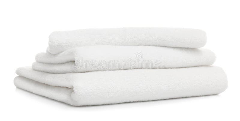 Stack of clean folded towels on white royalty free stock photos