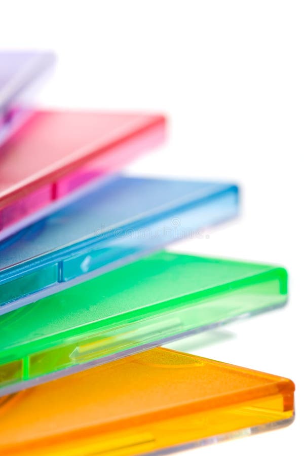 Stack of color boxes. Macro color stack of disc boxes with white background