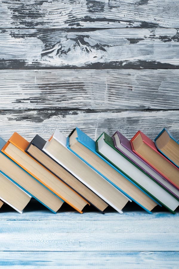 Stack of colorful books. Education background. Back to school. Book, hardback colorful books on wooden table. Education stock photos Stack of colorful books. Education background. Back to school. Book, hardback colorful books on wooden table. Education stock photos