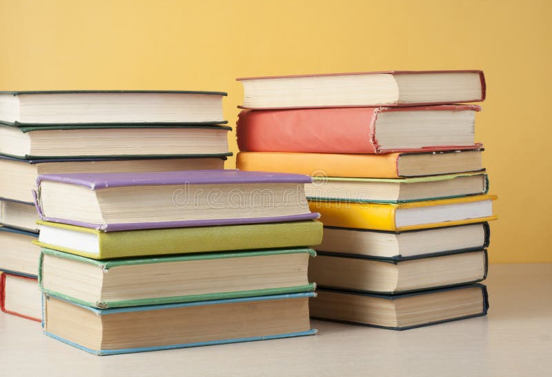 Stack of colorful books on the wooden table. Education background. Back to school. royalty free stock photo Stack of colorful books on the wooden table. Education background. Back to school. royalty free stock photo